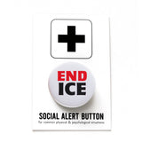 a round white pinback button that reads END ICE in a chunky Red & Black font. Button is on a Social Alert Button backing card.