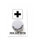 A round white pinback button that reads DEOMCRACY in black letters fallen to the bottom of the button. The pinback button is attached to a SOCIAL ALERT BUTTON backing card.