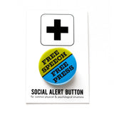 A round blue & lime green pinback button split down the middle. The green top half reads FREE SPEECH, the blue lower half reads FREE PRESS. Button is pinned to a SOCIAL ALERT BUTTON backing card.