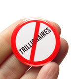 A round white button that reads NO TRILLIONAIRES in black text with a red circle and slash to indicate being against billionaires. Button is held in a hand.