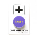 A purple pinback button that reads PANSY in a vintage yellow font. Badge is on a white backing card that reads SOCIAL ALERT BUTTON in black text.