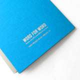 back of a blue greeting card with silver foil that says Word for word, hand pressed in Los Angeles.