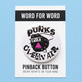 Round white 2.25" pinback button that reads Punks For Clean Air in a rough black font over the image of a studded black KN95 mask with a pink triangle. Button is on a Word For Word branded backing card that reads Wear What Is On Your Mind