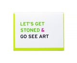 Smart Stoner Greeting Card, that reads LET'S GET STONED & GO SEE ART. White card with green, pink and black san serif text. Set with a neon green envelope.