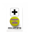 A round lime green pinback button that reads YAPPER OF THE YEAR in a chunky purple text. Button is on a Social Alert Button backing card.