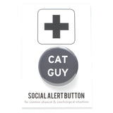 Round medium gray 1.25" pinback button that reads CAT GUY in white text button is on a Social Alert Button backing card.