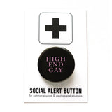 Round, black pinback button that reads HIGH END GAY in a thin pink serif font. Button is on a Social Alert Button backing card.