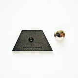 The back of THE PERSONAL IS POLITICAL enamel pin - single locking back with a locking clasp back.