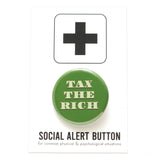Round pinback button that says TAX THE RICH.  The text is a light green, on a money green background.  The button is on a Social Alert Button backing card.