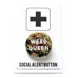 Round pinback button that reads WEED QUEEN in white text over a background of cannabis flower. Button is on a Social alert Button backing card.