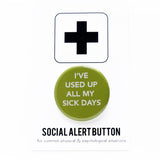 a round moss-lime green pinback button that reads I've Used Up All My Sick Days in white text. Button is on a Social Alert Backing card.